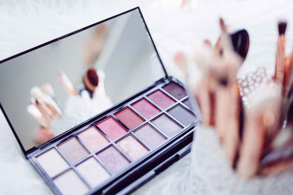 makeup palette with brushes